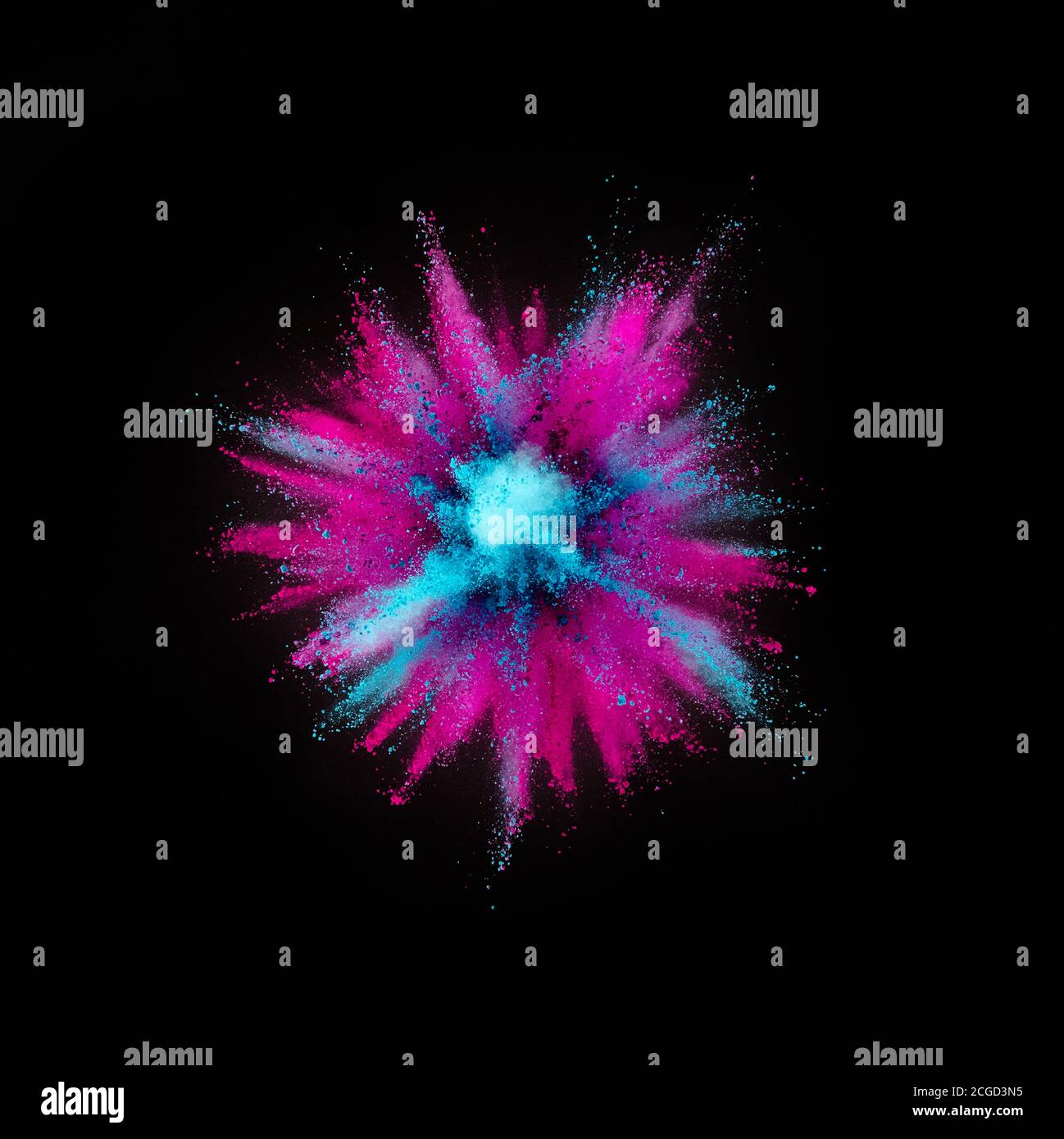 Colored powder explosion isolated on black background Stock Photo - Alamy