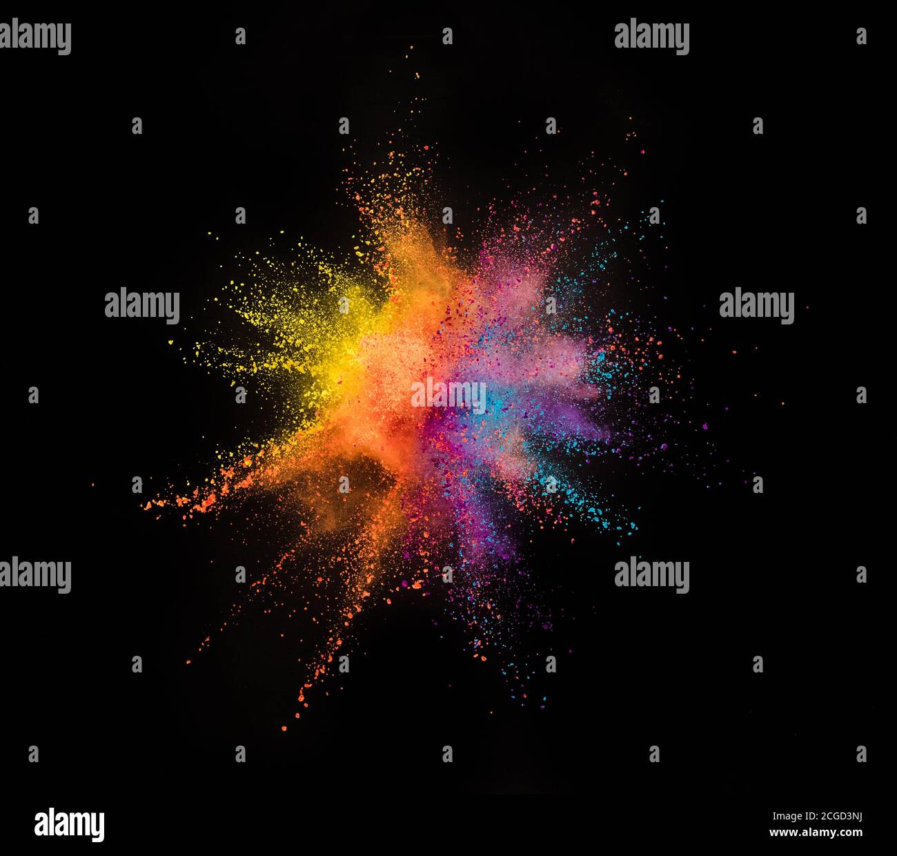Colored powder explosion isolated on black background Stock Photo - Alamy