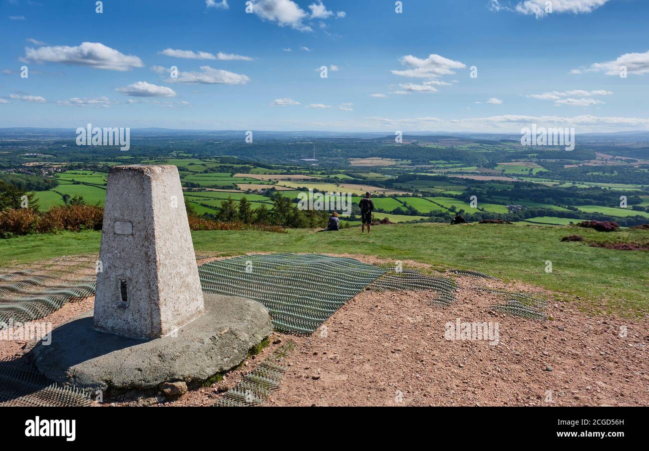 The summit trig point on the Wrekin, overlooking Ironbridge and the Severn valley, The Wrekin, Shropshire Stock Photo