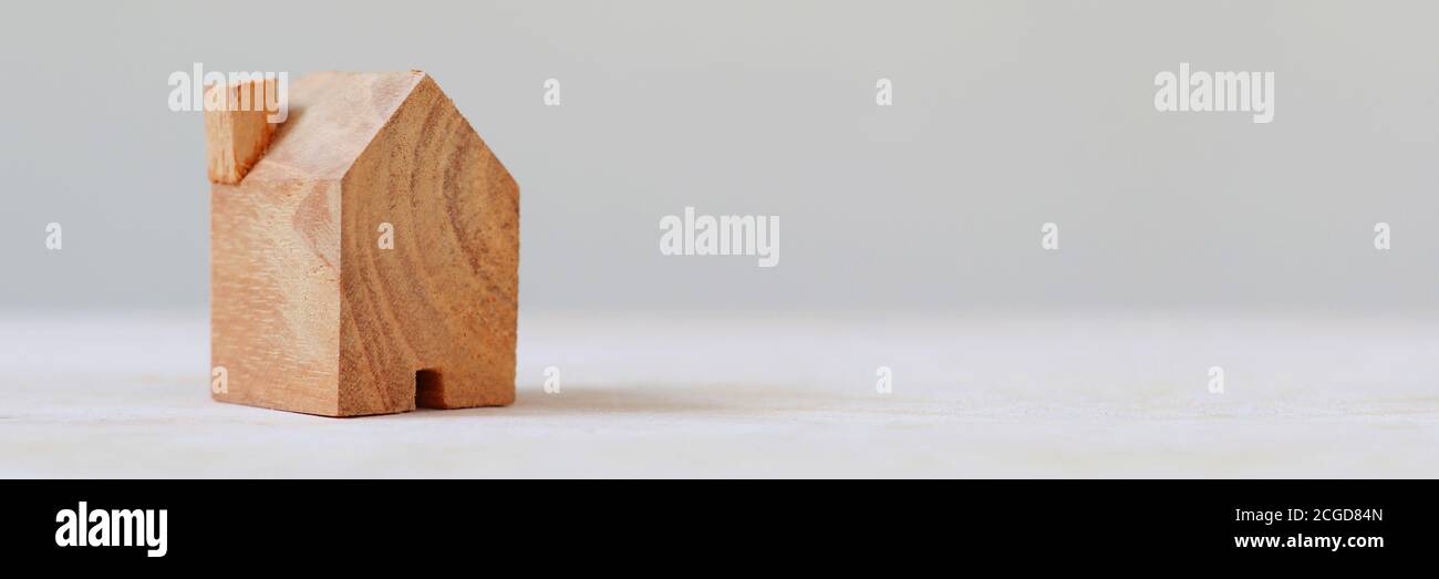 Wooden house model with copy space on the right. Stock Photo