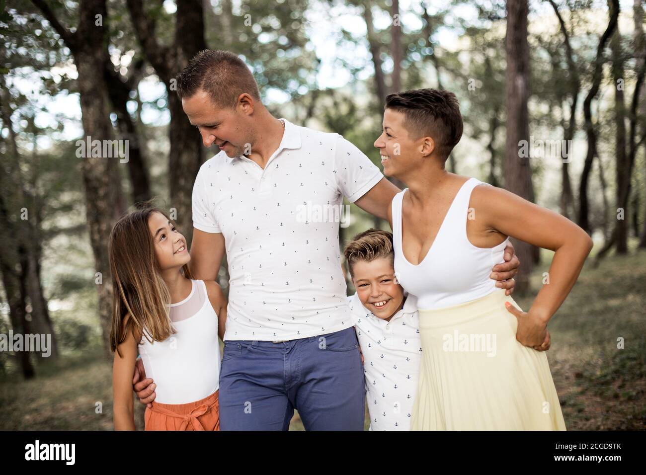 Mother, teenage daughter, brother and father having fun Stock Photo Alamy