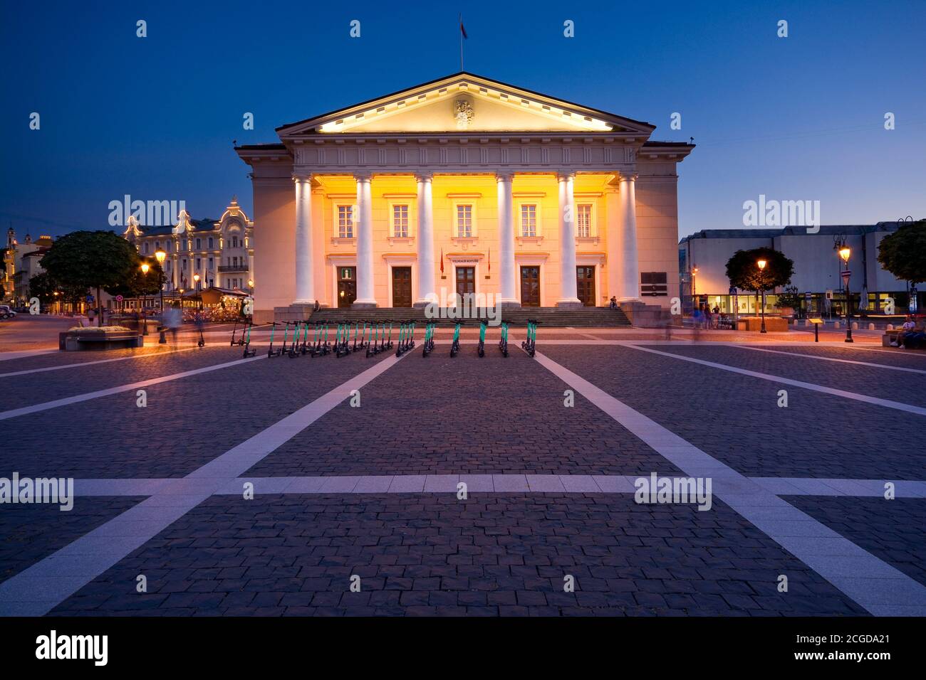 Night view of illuminated Town Hall in the Town Hall Square in the Old Town of Vilnius, Lithuania Stock Photo