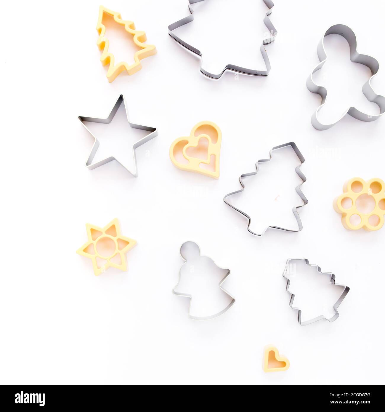 Christmas baking molds on white background. Flat lay, top view bakery