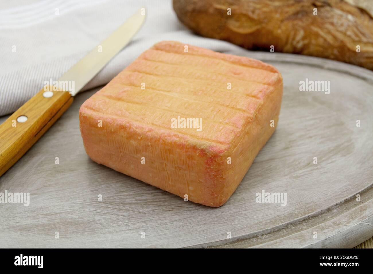maroilles on a cutting board Stock Photo