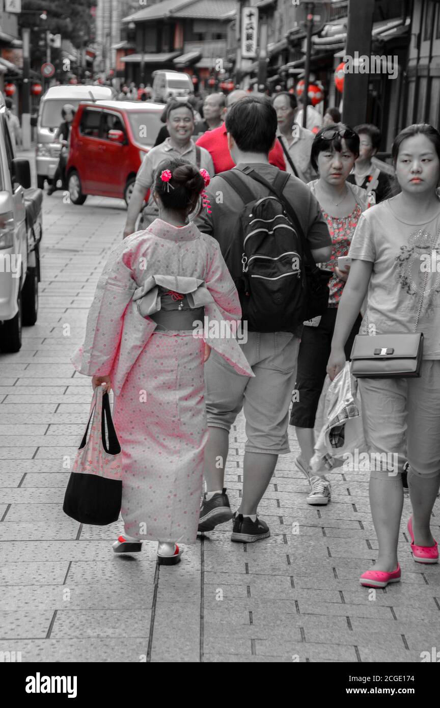 Woman In Kimono Walking At The Kyoto Streets Japan 7-9-2015 Stock Photo