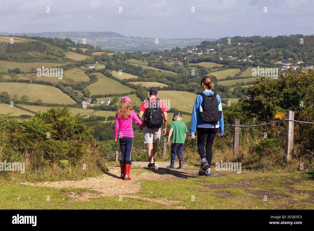 Family walking in beautiful countryside. Stock Photo