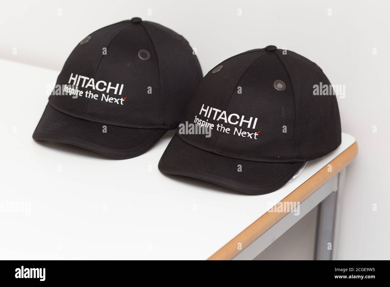 Hitachi Inspire the Next saefty caps Stock Photo - Alamy