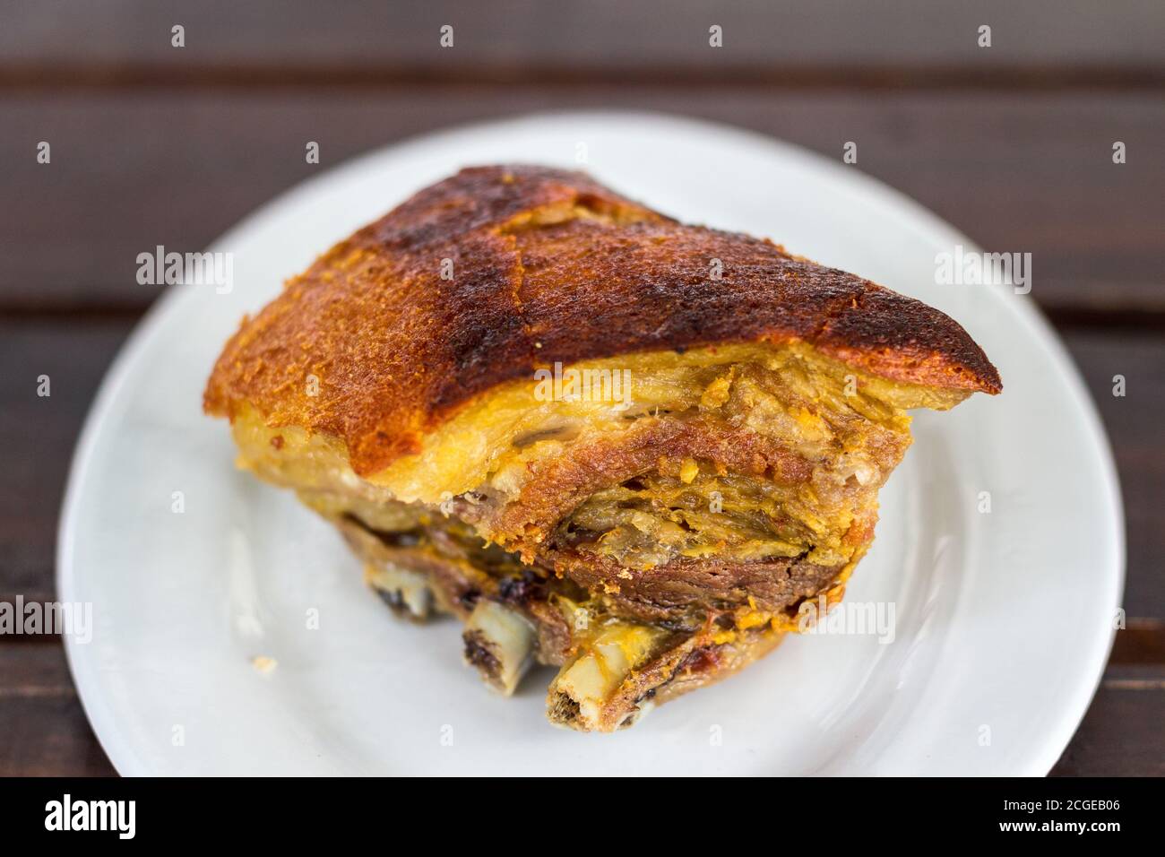 A crispy and delicious piece of lechon kawali, deep fried pork which is