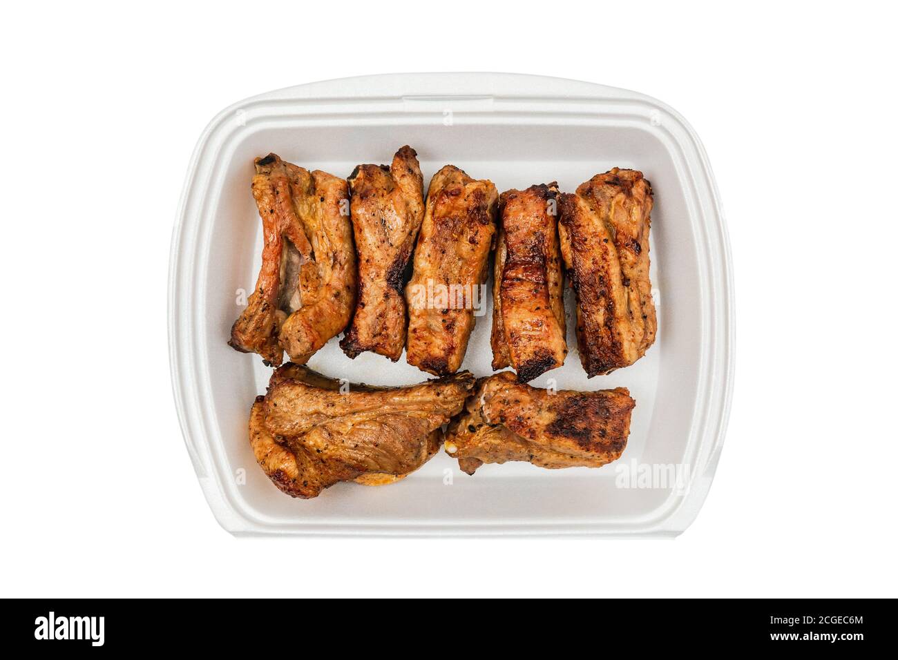 Grilled pork ribs in a white box, top view, isolated Stock Photo - Alamy