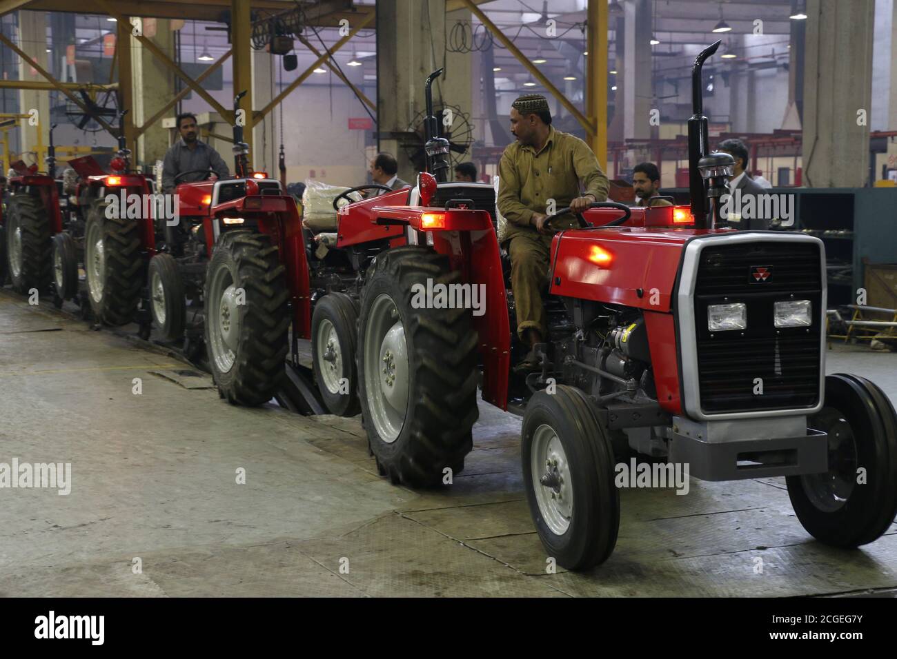 assembly stage the body of millat tractor at factory and tractor parts