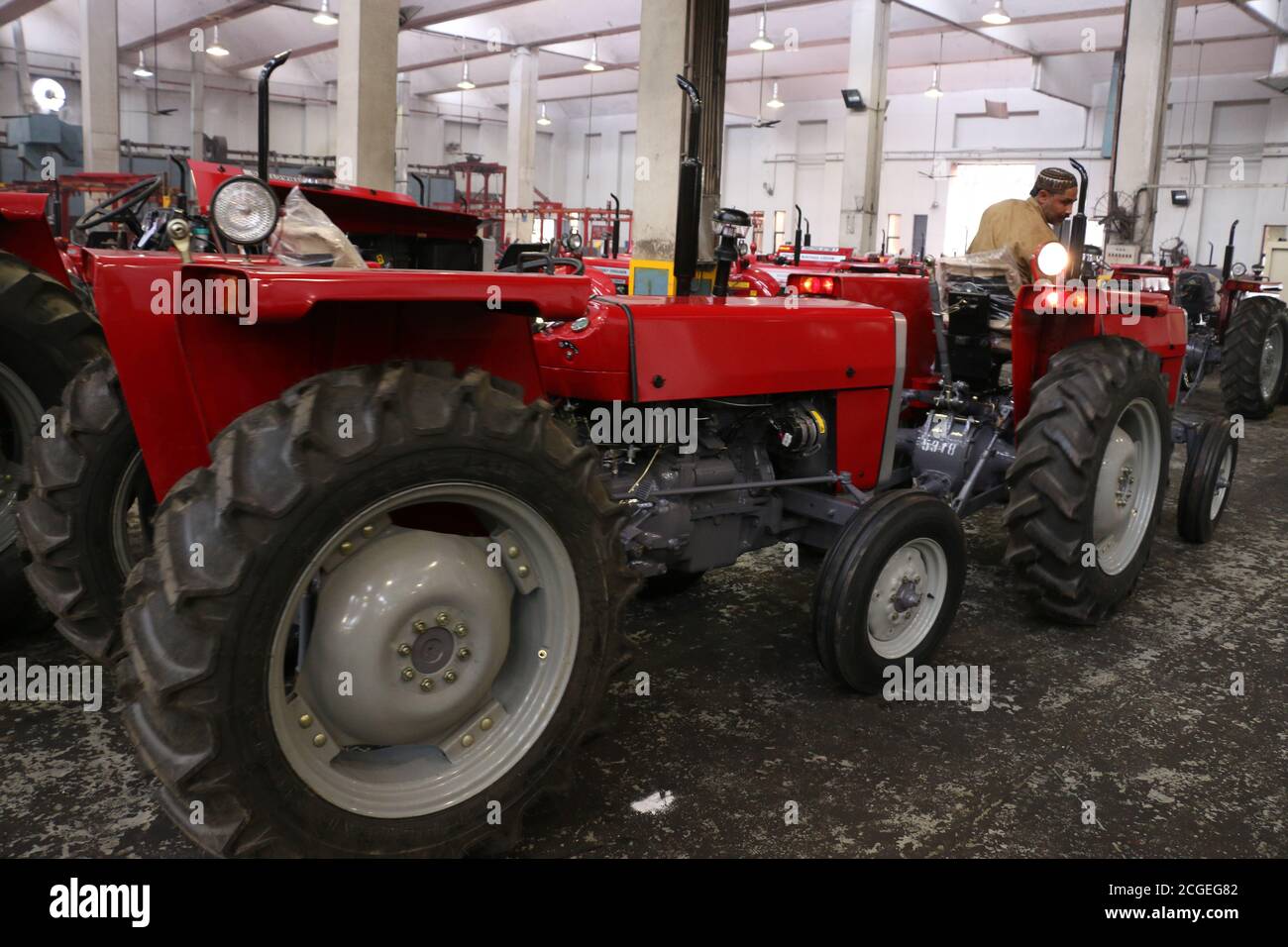 assembly stage the body of millat tractor at factory and tractor parts