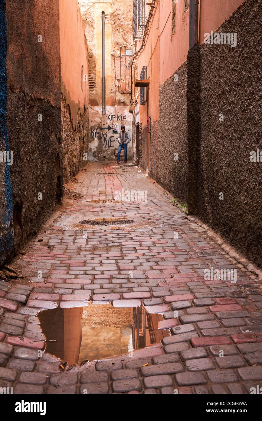 Colorful, old, textured alley in the souk of Marrakech, Morocco Stock Photo