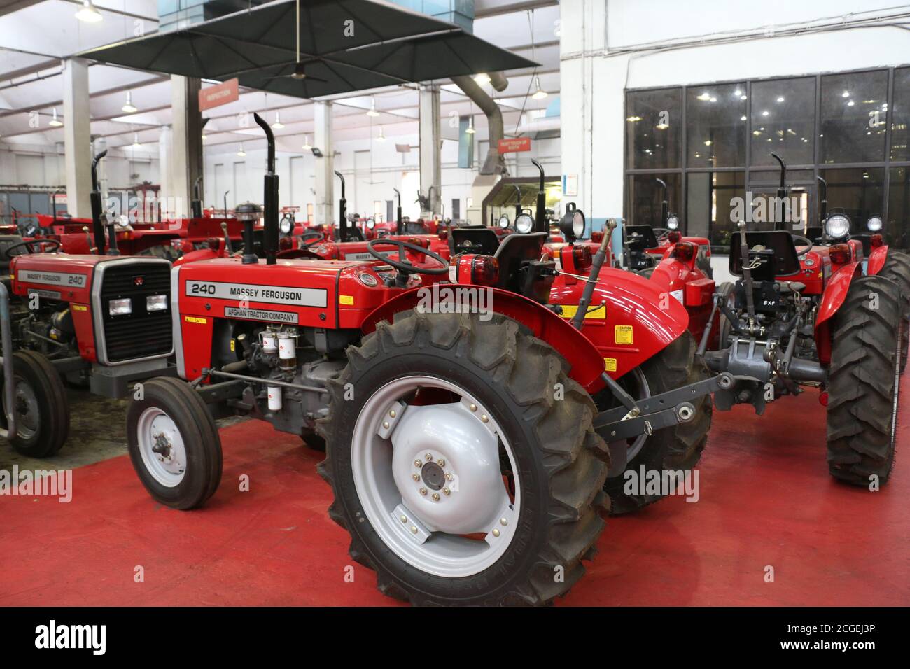 assembly stage the body of millat tractor at factory and tractor parts