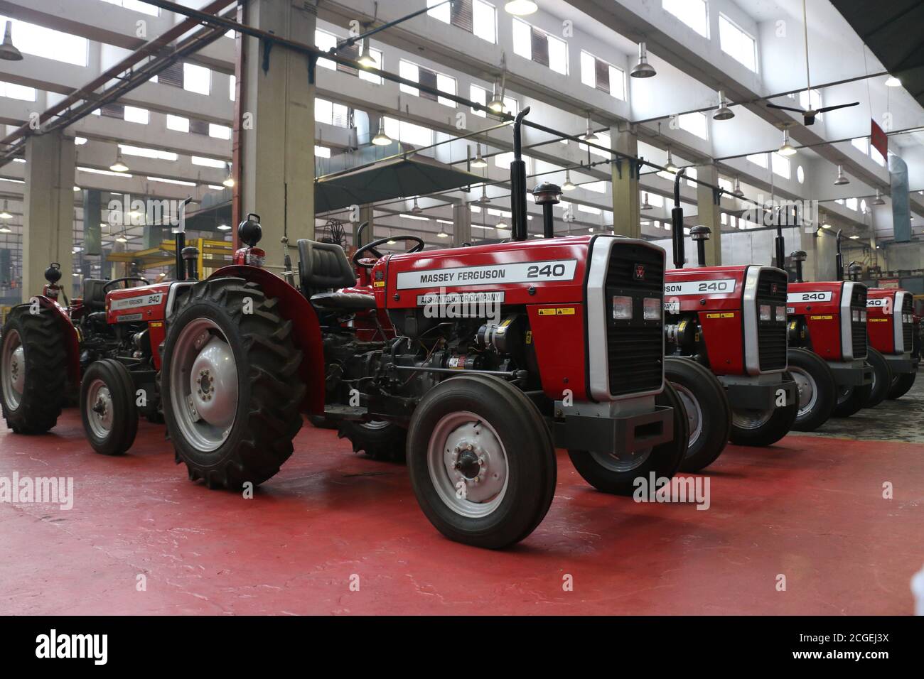 assembly stage the body of millat tractor at factory and tractor parts