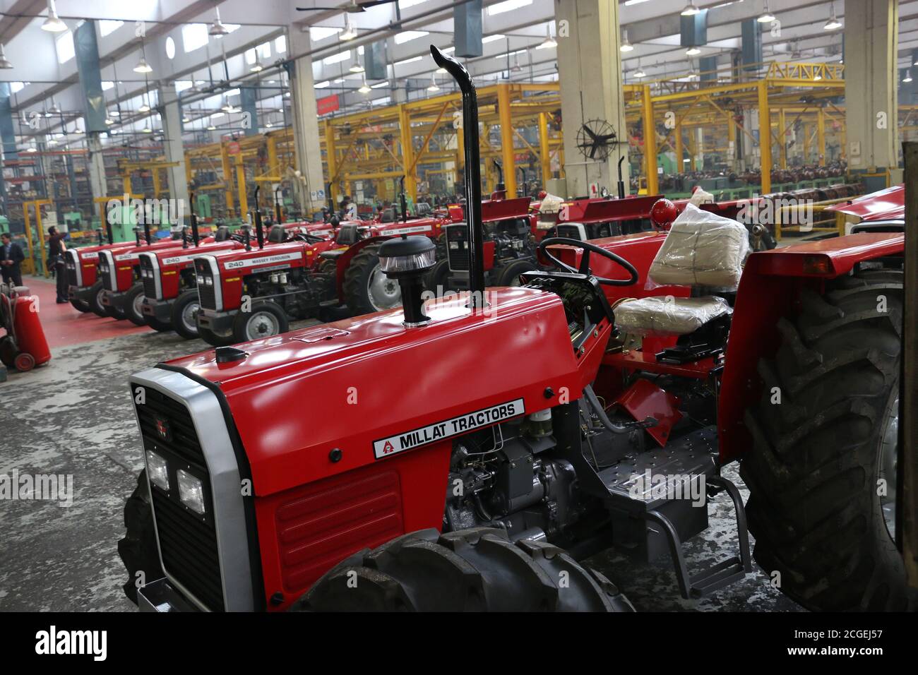 assembly stage the body of millat tractor at factory and tractor parts