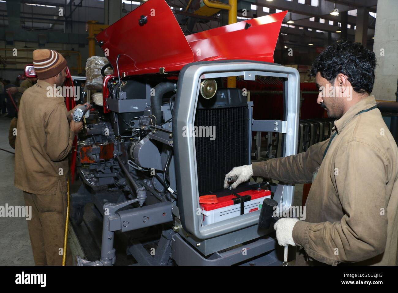 Tractor assembly line hires stock photography and images Alamy