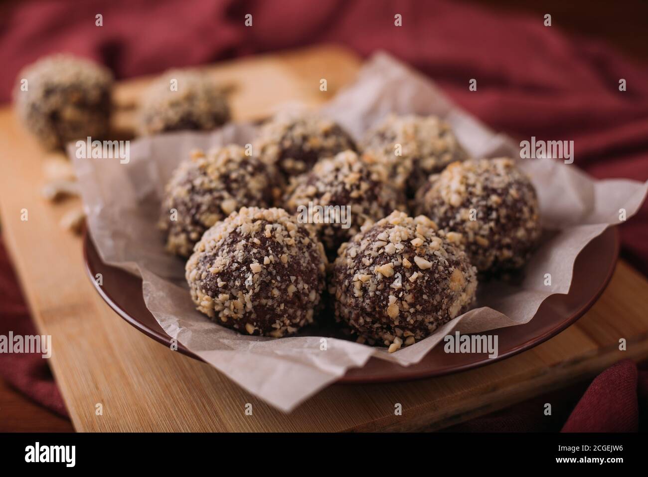 Cocoa Balls Chocolate Truffles Cakes On Board On Wooden Background Cashew Nuts Sprinkled Stock Photo Alamy