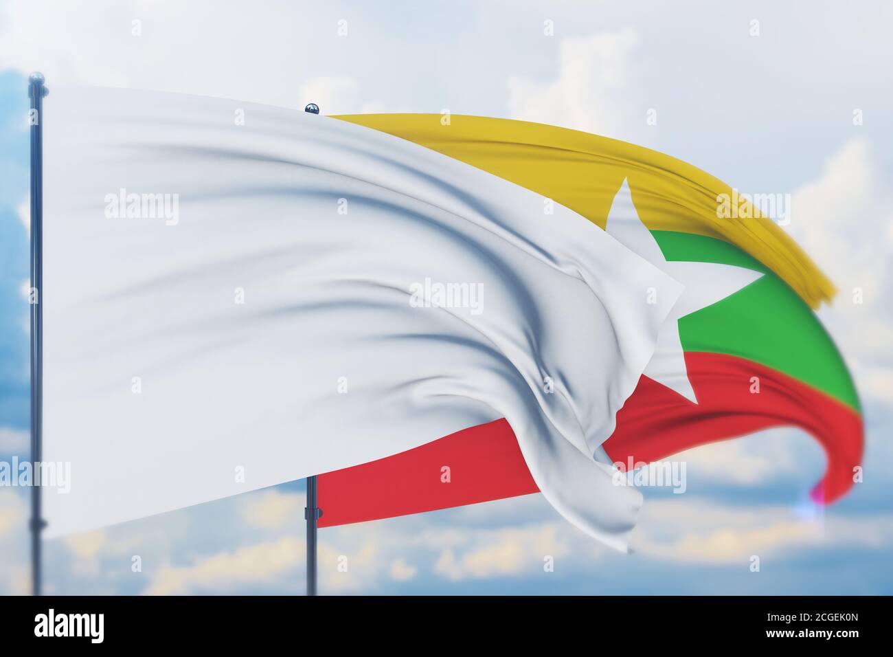 White flag on flagpole waving in the wind and flag of Myanmar. Closeup ...