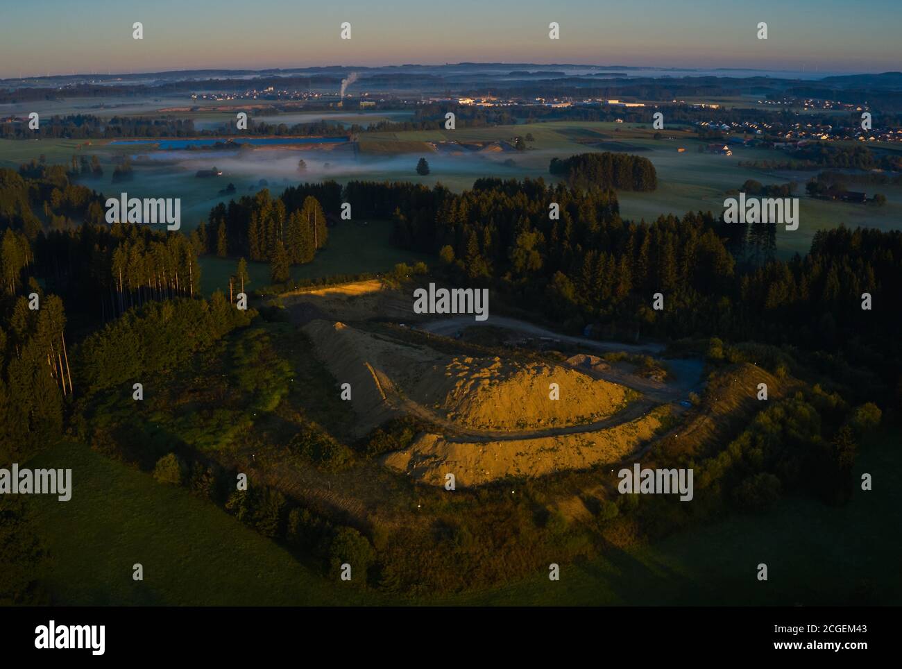 Waste disposal site with fog in the morning, short after sunrise in Marktoberdorf, Germany, 9th September, 2020.  © Peter Schatz / Alamy Live News Stock Photo