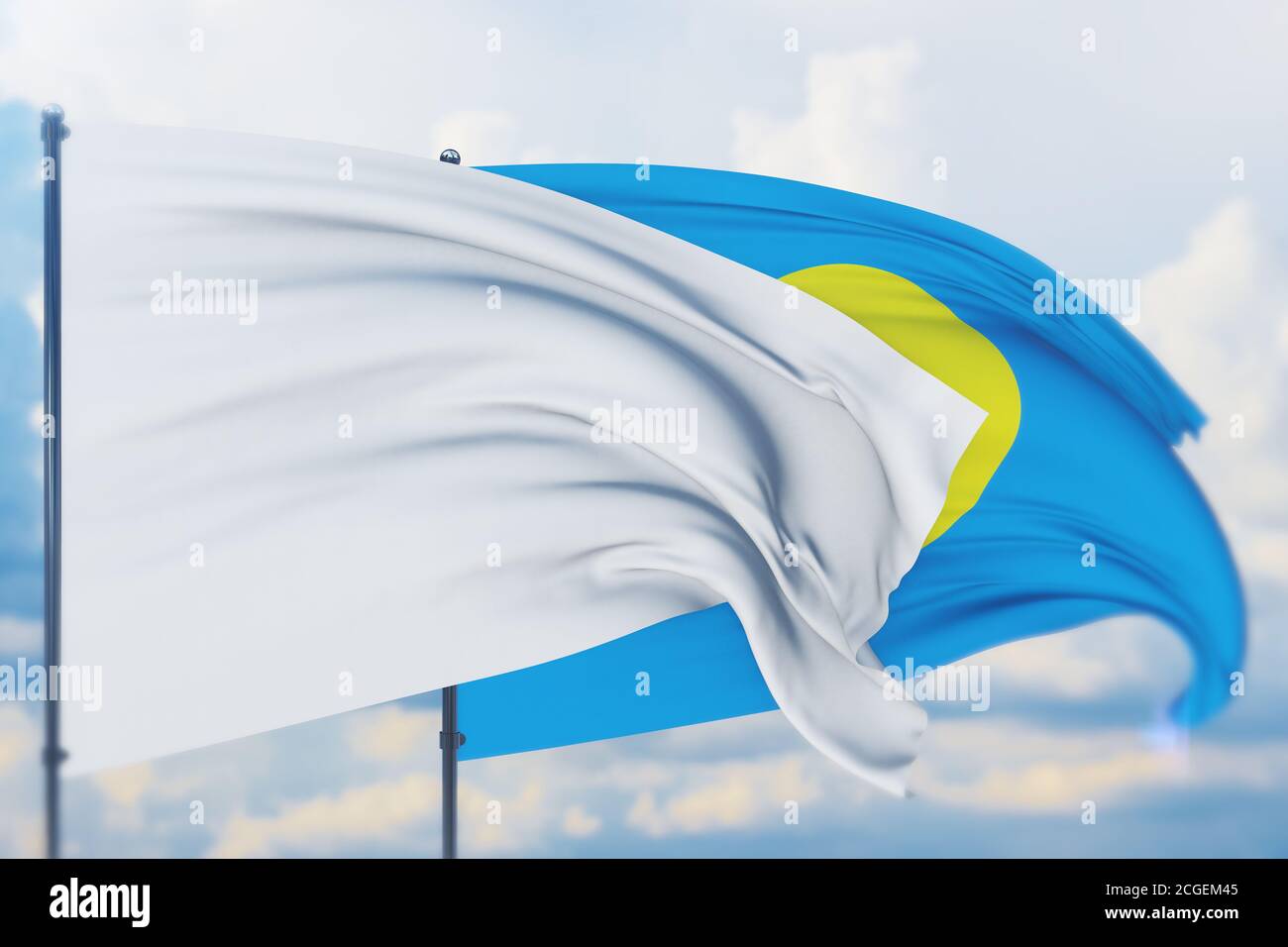 White flag on flagpole waving in the wind and flag of Palau. Closeup ...