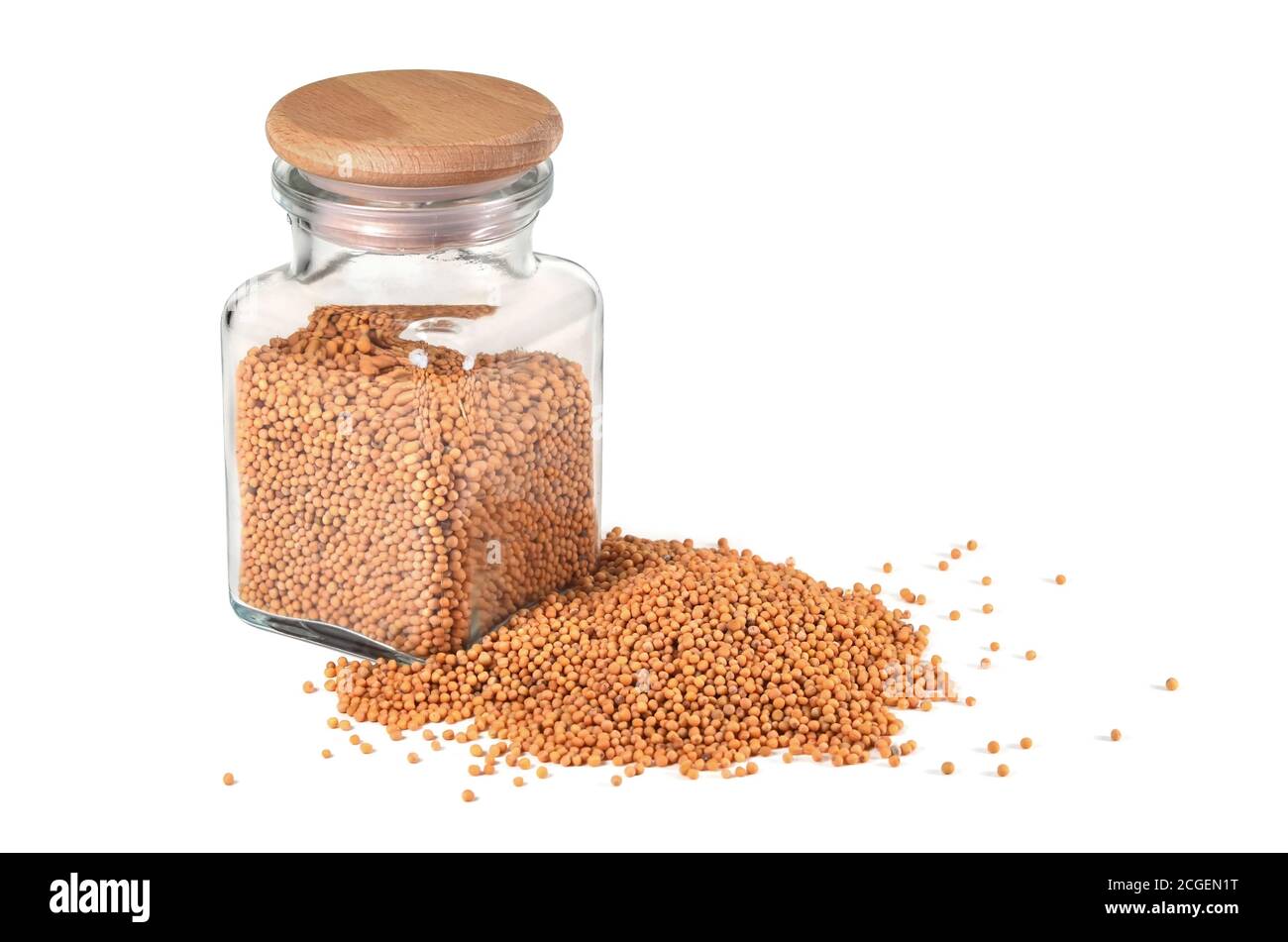 Spice, mustard. Mustard seeds, in a jar for spices on a white