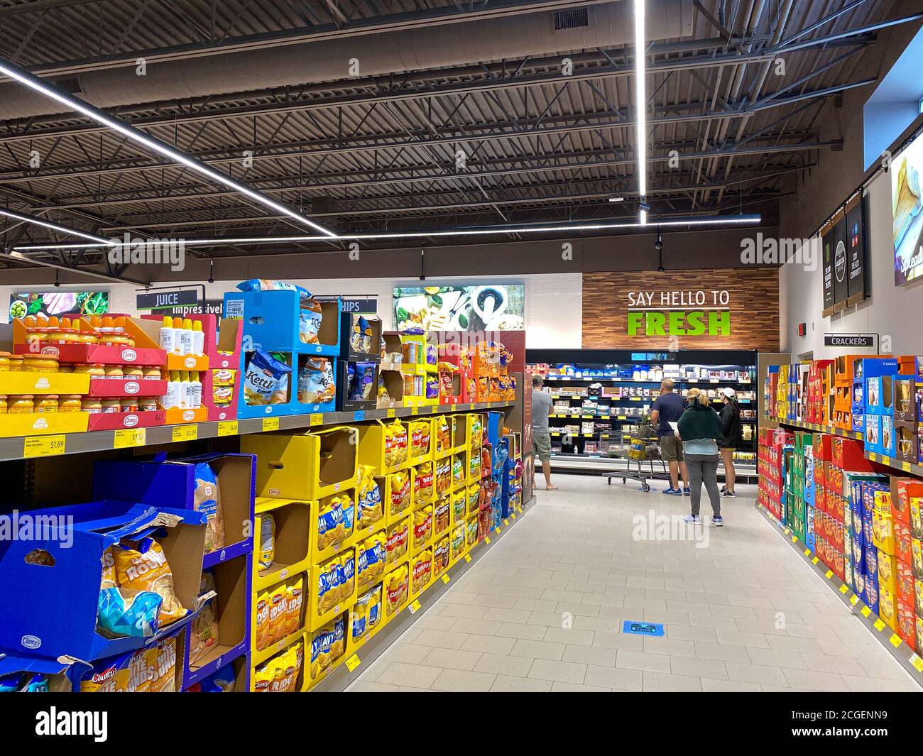 Orlando, FL/USA-5/16/20:  A display of a variety of potato chips and cookies at an Aldi grocery store waiting for customers to purchase. Stock Photo