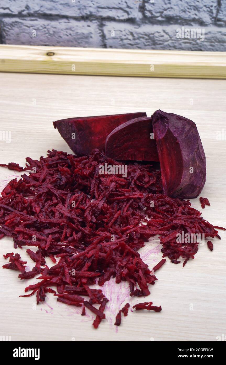 fresh beet grated, grate beetroot on a grater Stock Photo