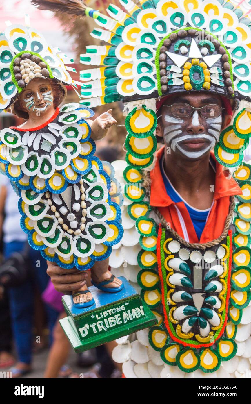 A reveler in costume during the Atiatihan Festival in Kalibo town