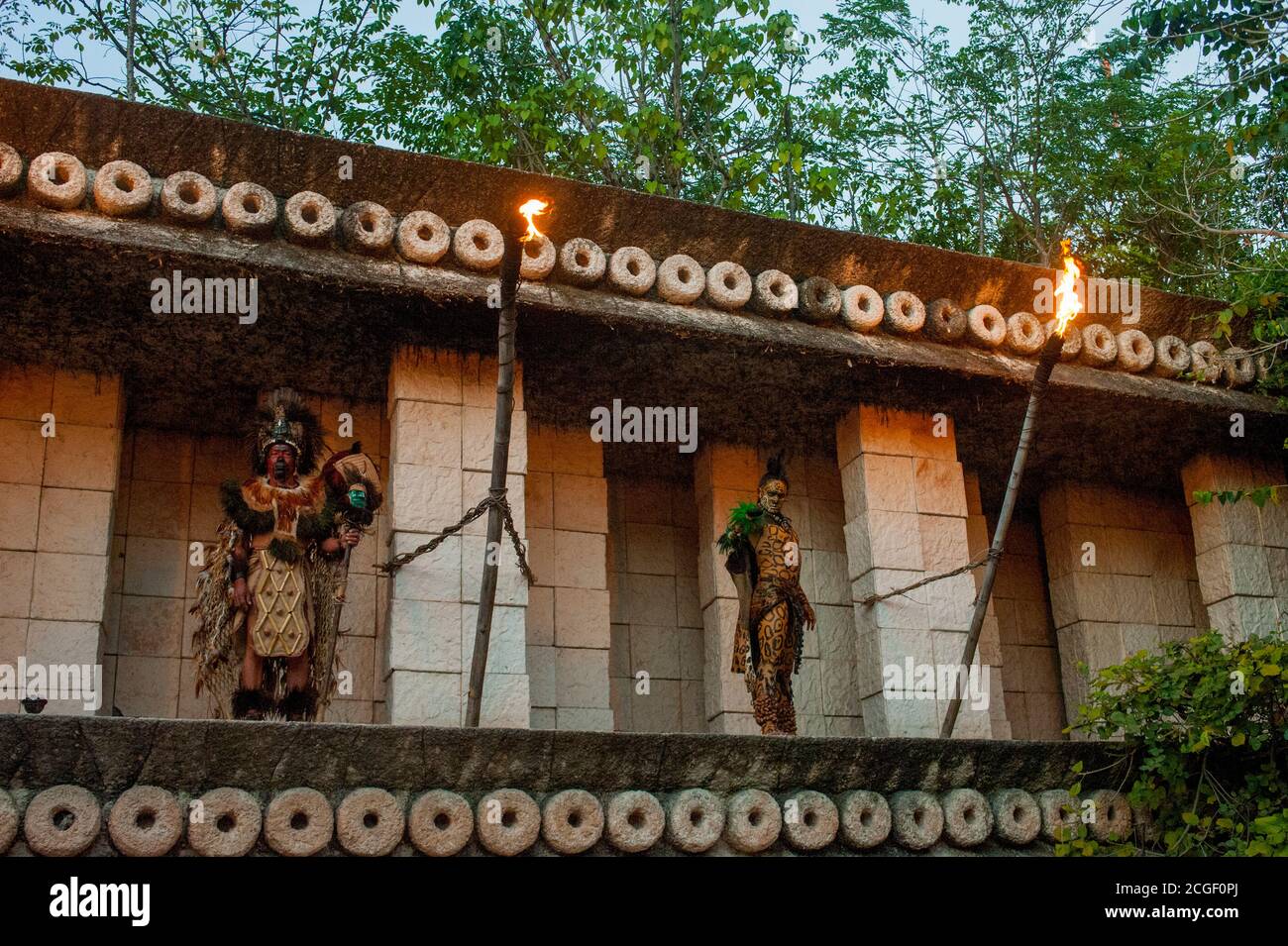 Mayan warriors at the entrance to the night show performed at the Xcaret Eco Theme Park on the Riviera Maya near Cancun in the state of Quintana Roo, Stock Photo