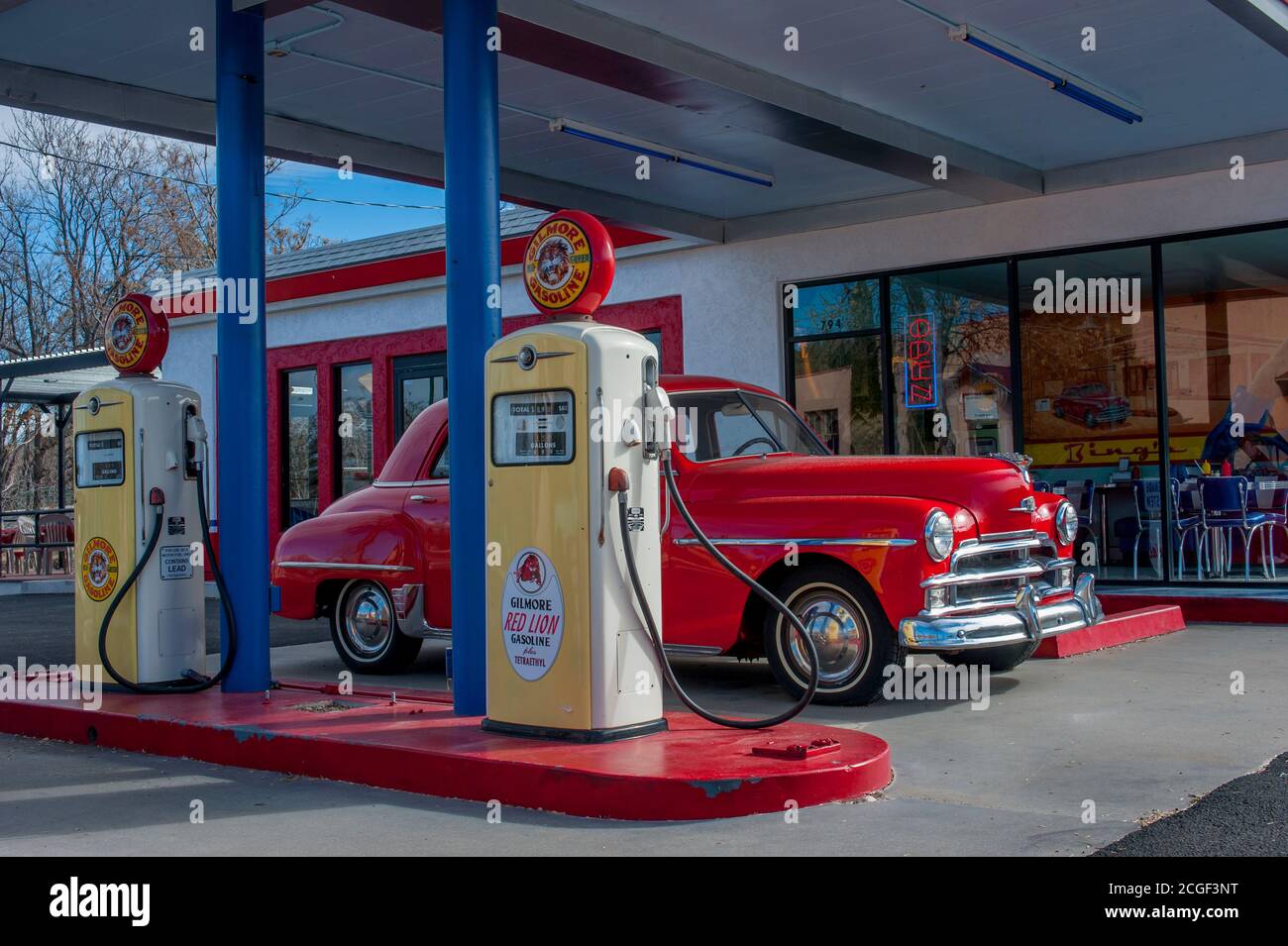 A 1950 Plymouth Deluxe car at an old gas station, now a Bings Burger Restaurant, in the old part of town of in Cottonwood, a historic city in the Verd Stock Photo