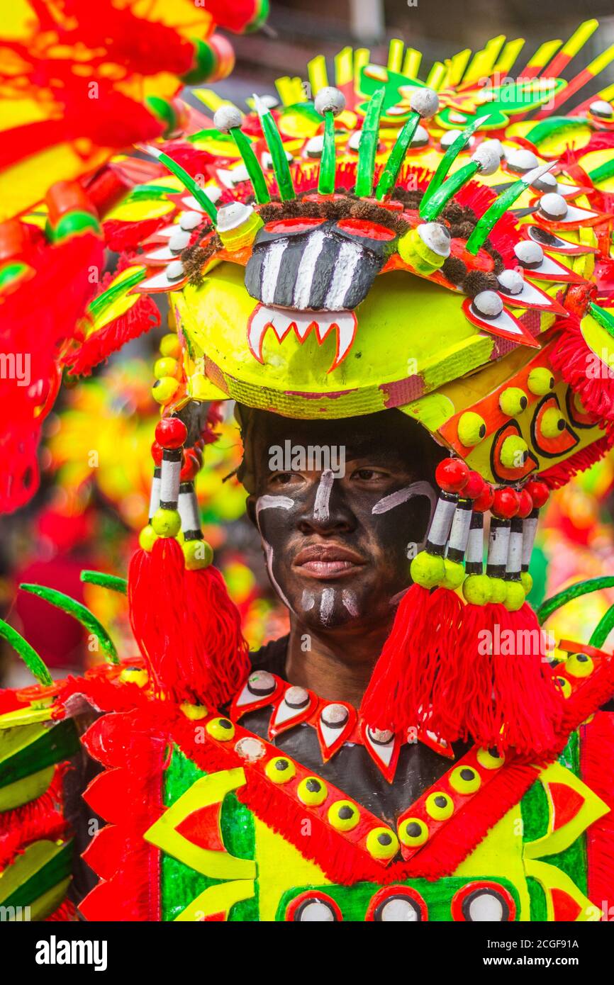 A reveler in costume during the Atiatihan Festival in Kalibo, Aklan
