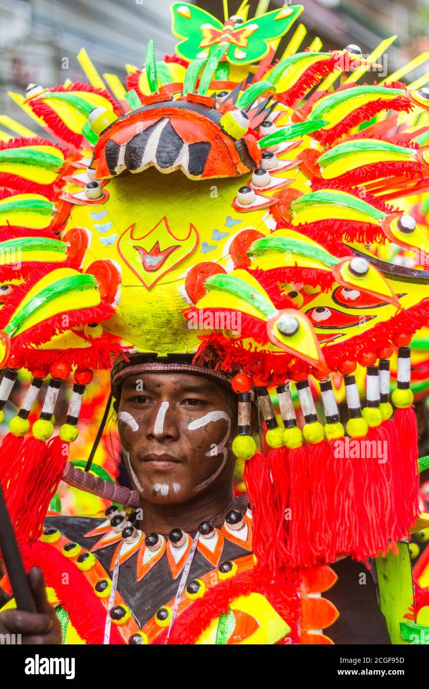 A reveler in costume during the Ati-atihan Festival in Kalibo, Aklan,  Philippines. The event is held every third Sunday of January Stock Photo -  Alamy