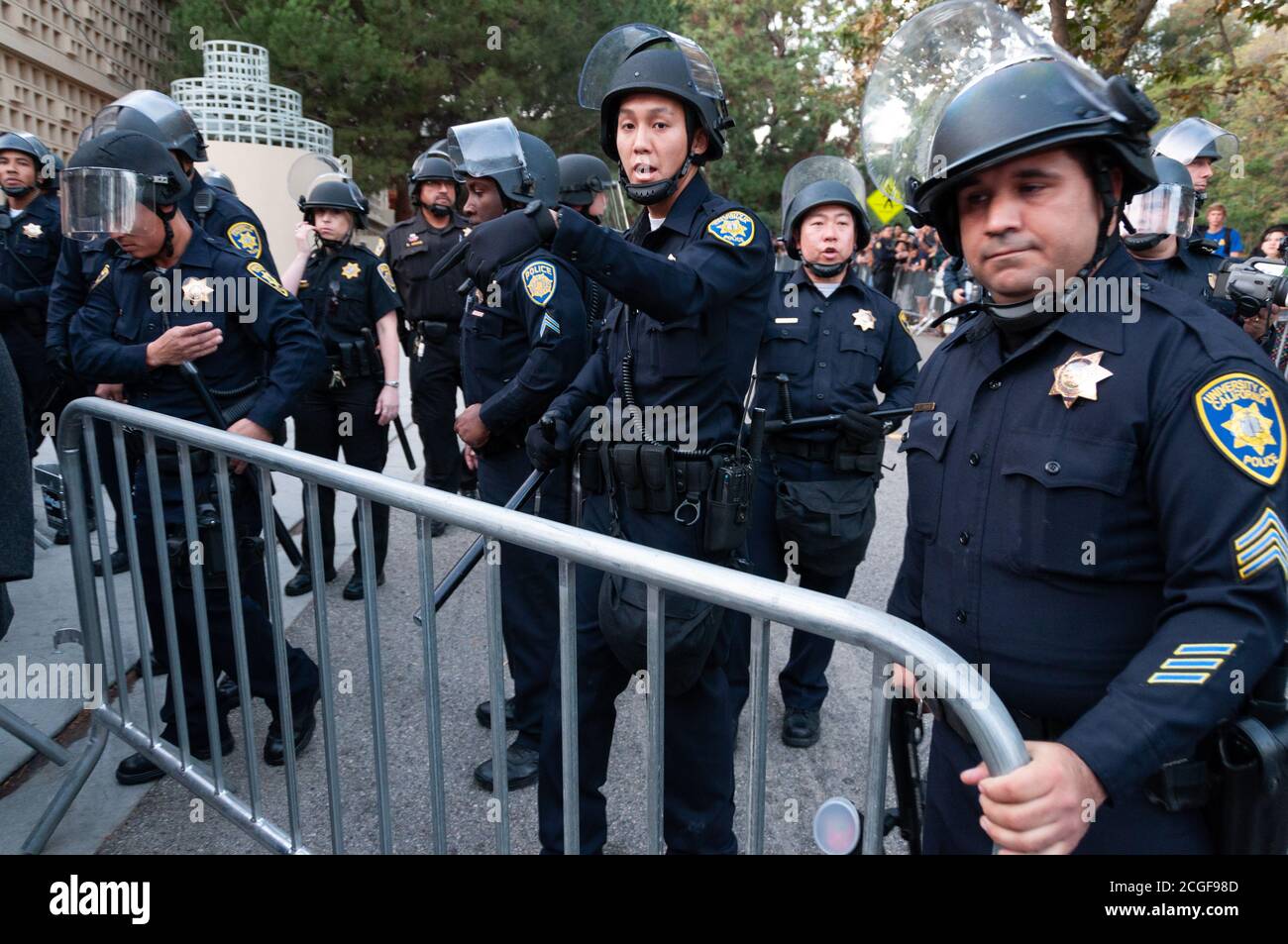 Los Angeles, CA, USA. 20th Nov, 2009. Students and police officers face off during a protest against a 32 percent tuition increase at the University o Stock Photo