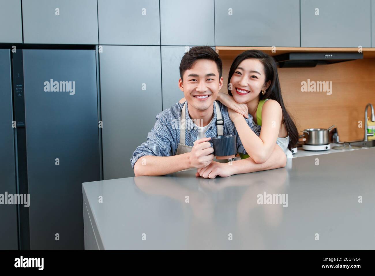 Women sitting around kitchen table hi-res stock photography and images ...