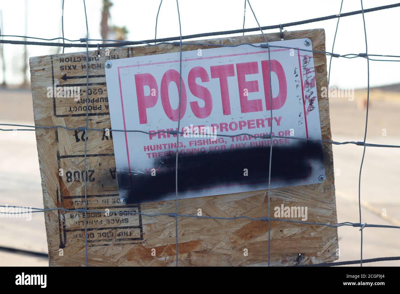 Posted private property sign at the abandoned Lake Dolores Waterpark, Newberry Springs, CA. Stock Photo