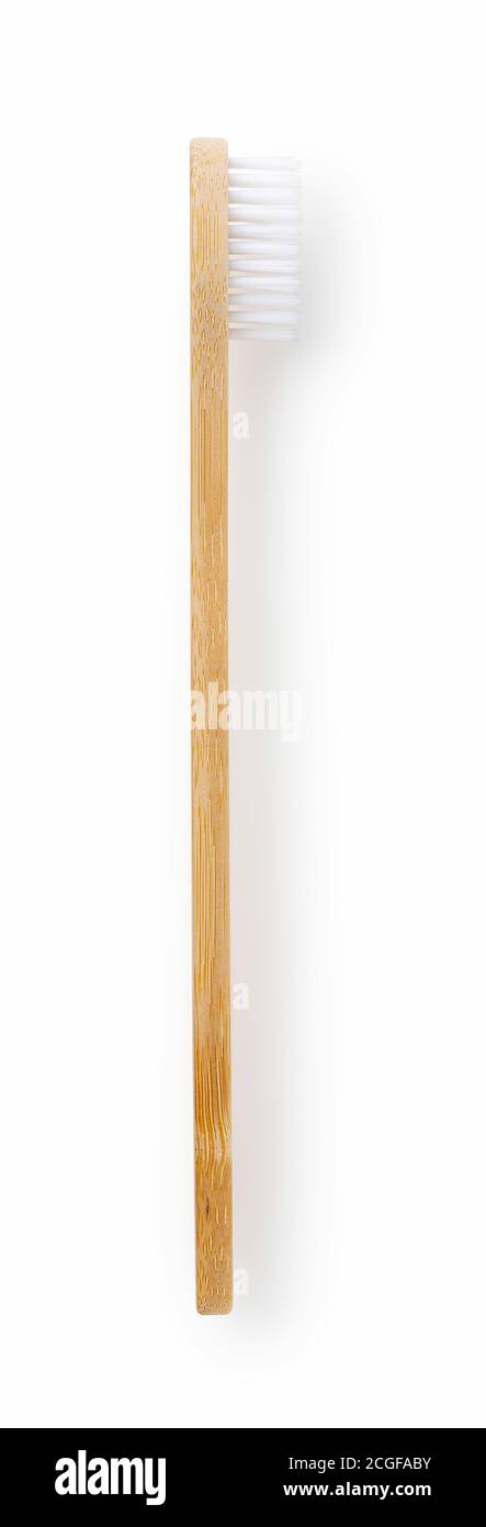 Bamboo toothbrush on a white background Stock Photo - Alamy