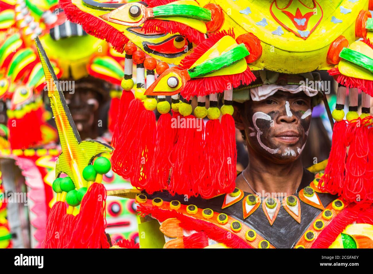 A reveler in costume during the Atiatihan Festival in Kalibo, Aklan