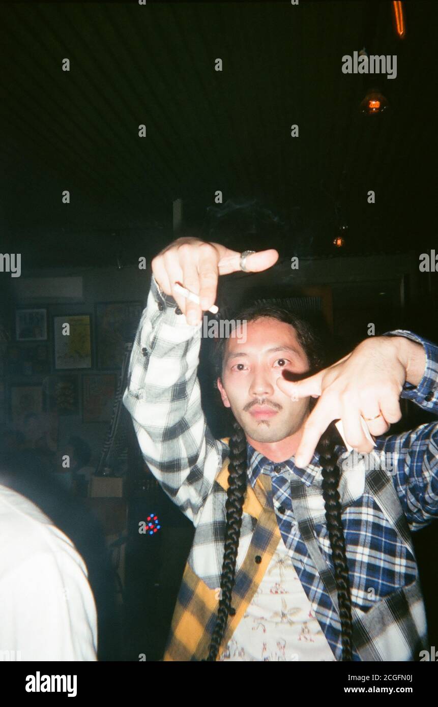 Portraits of jakarta youth indie party scene on disposable camera Stock