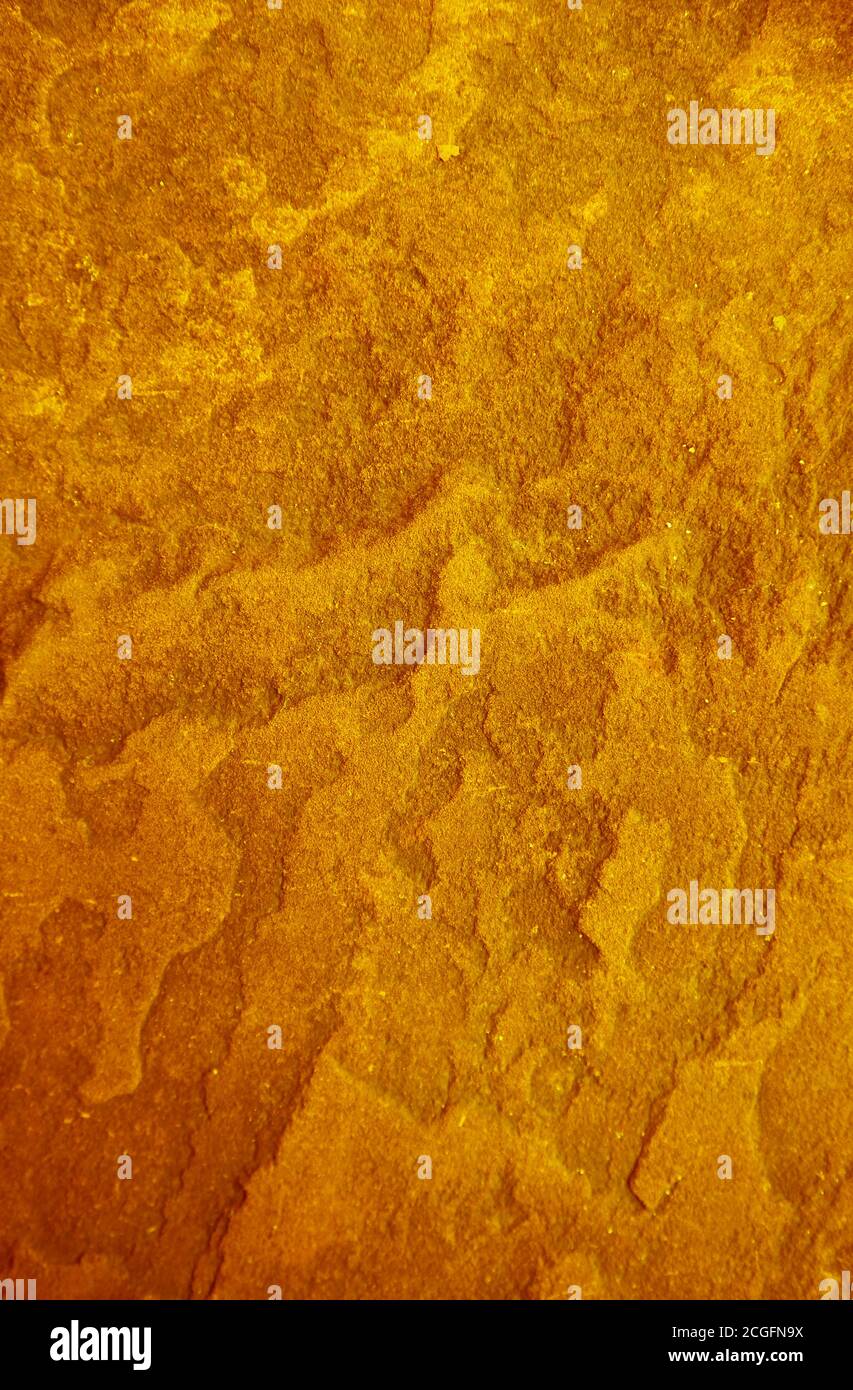 Pop art style gold colored rough stone's surface texture Stock Photo