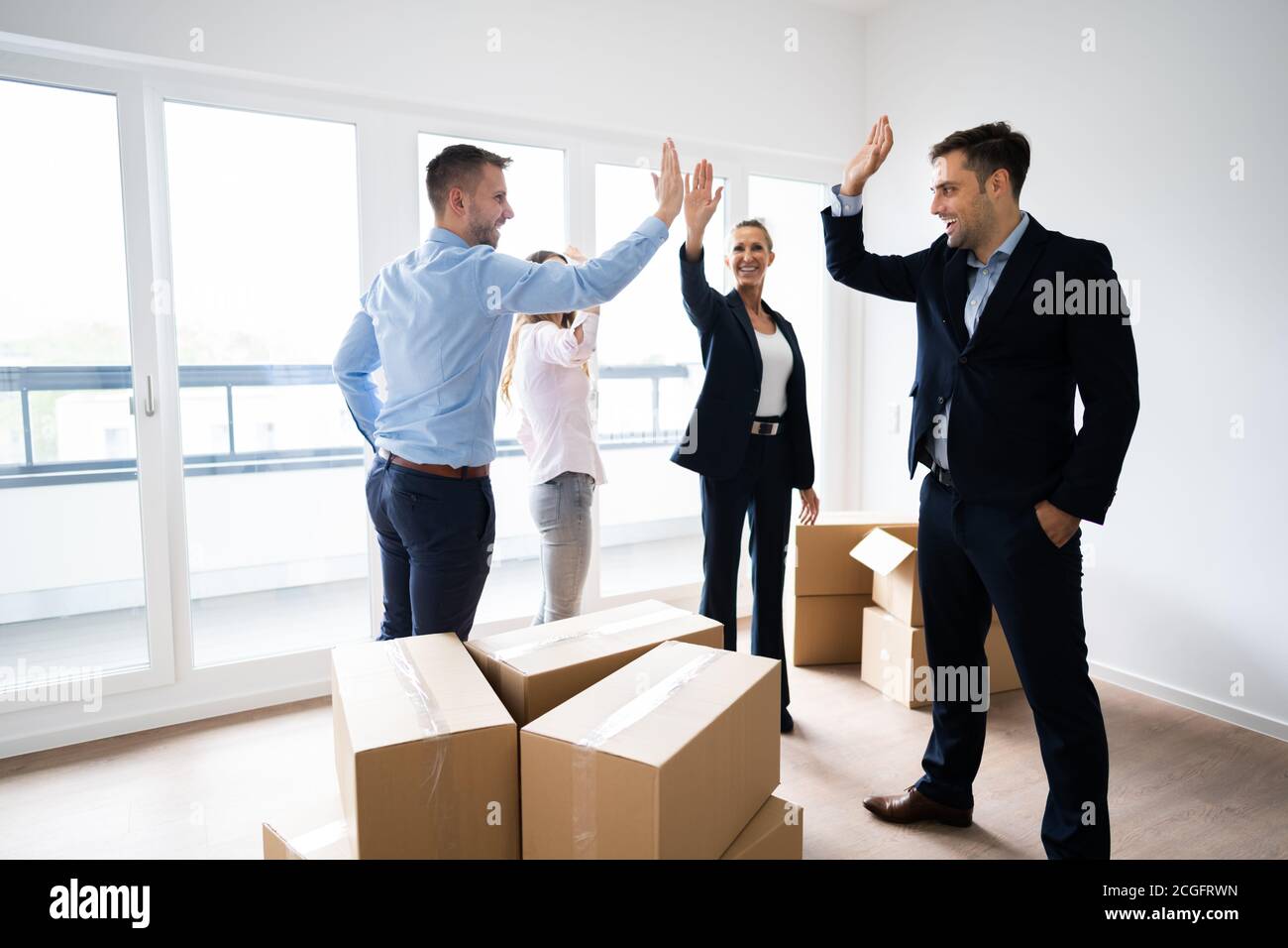 Diverse group people high five hi-res stock photography and images - Alamy