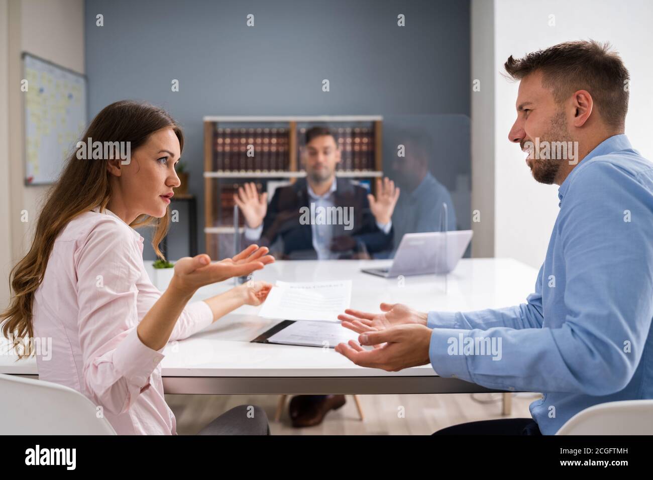 Angry Family Dispute With Lawyer In Court Wearing Face Masks Stock Photo