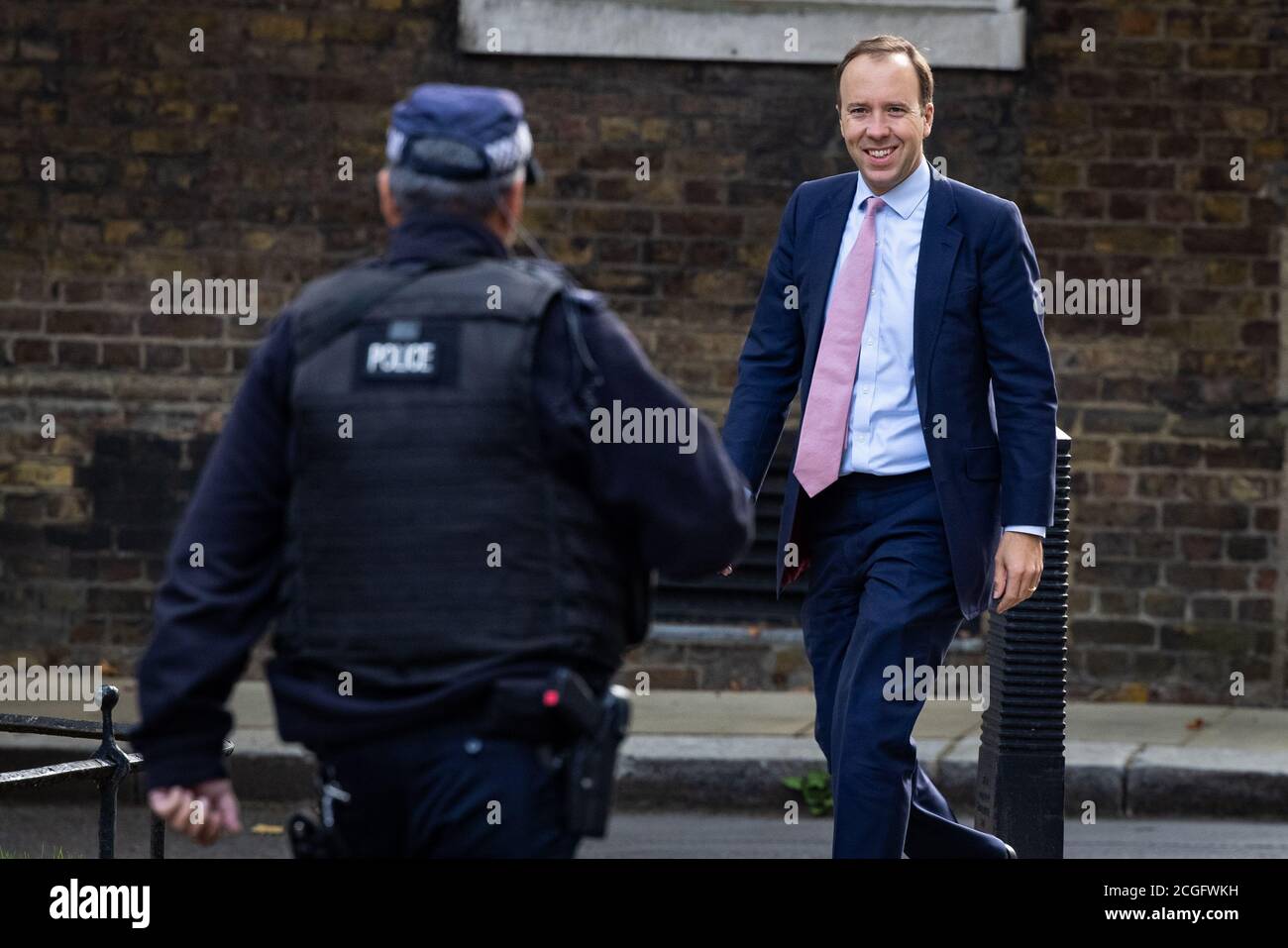 Health Secretary Matt Hancock, arrives in Downing Street, London. Boris Johnson is facing open revolt from some Tory backbenchers over new lockdown restrictions. It comes after reports that ministers are divided over new social distancing rules in England which will limit social gatherings to groups of six people both indoors and outside from Monday. Stock Photo