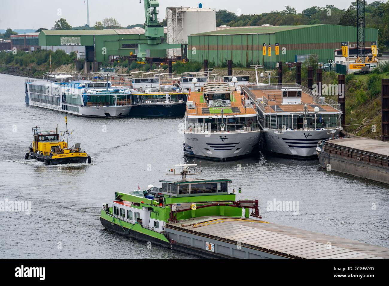River cruise ships of various shipping companies are anchored in Duisburg's Ruhrort Port, they are not needed due to declining passenger numbers durin Stock Photo
