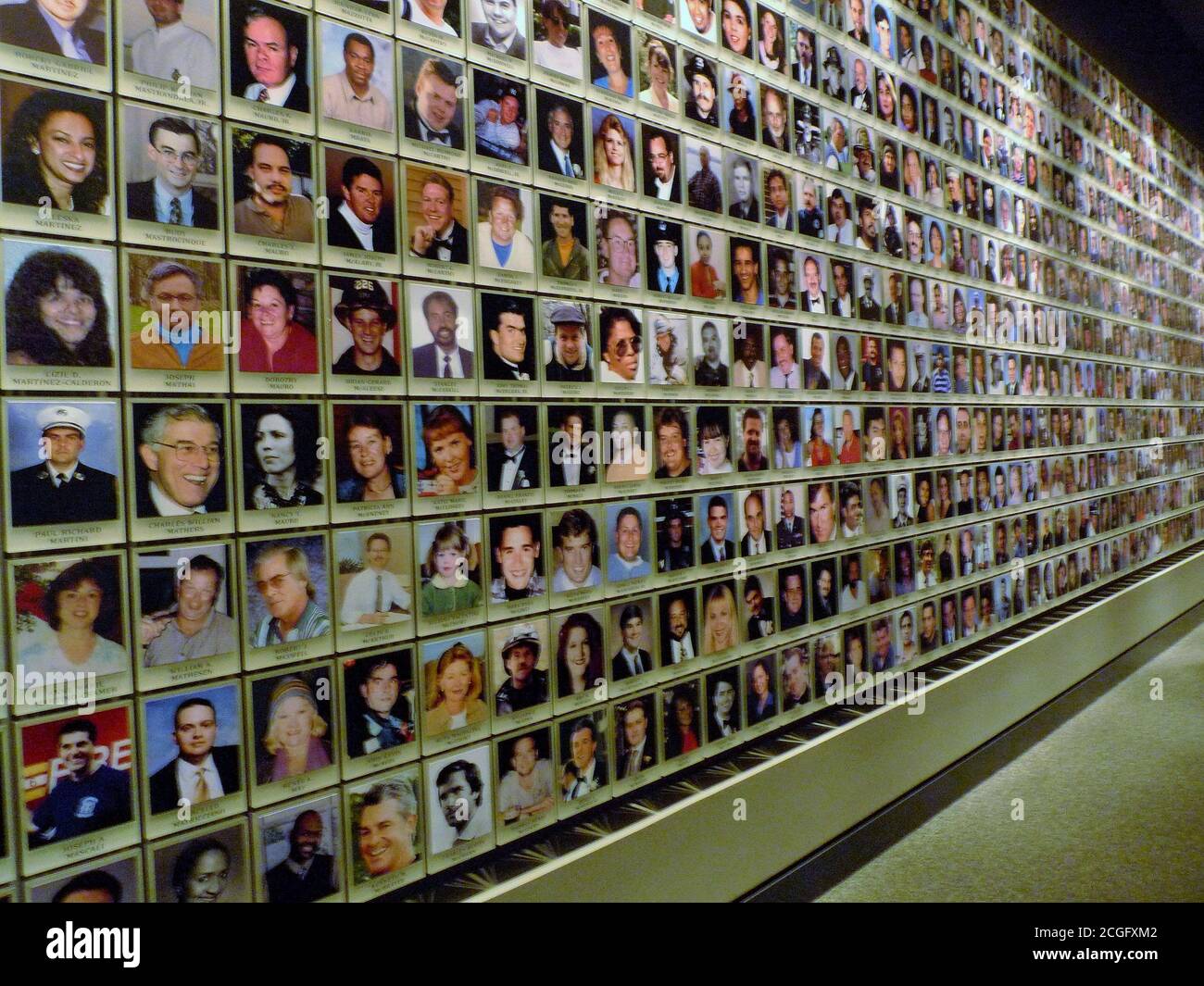 NATIONAL SEPTEMBER 11 MEMORIAL & MUSEM. THE WALL WITH THE FACES OF THE WOMEN AND THE MEN WHO DIED DURING THE TERRORIST ATTACK Stock Photo