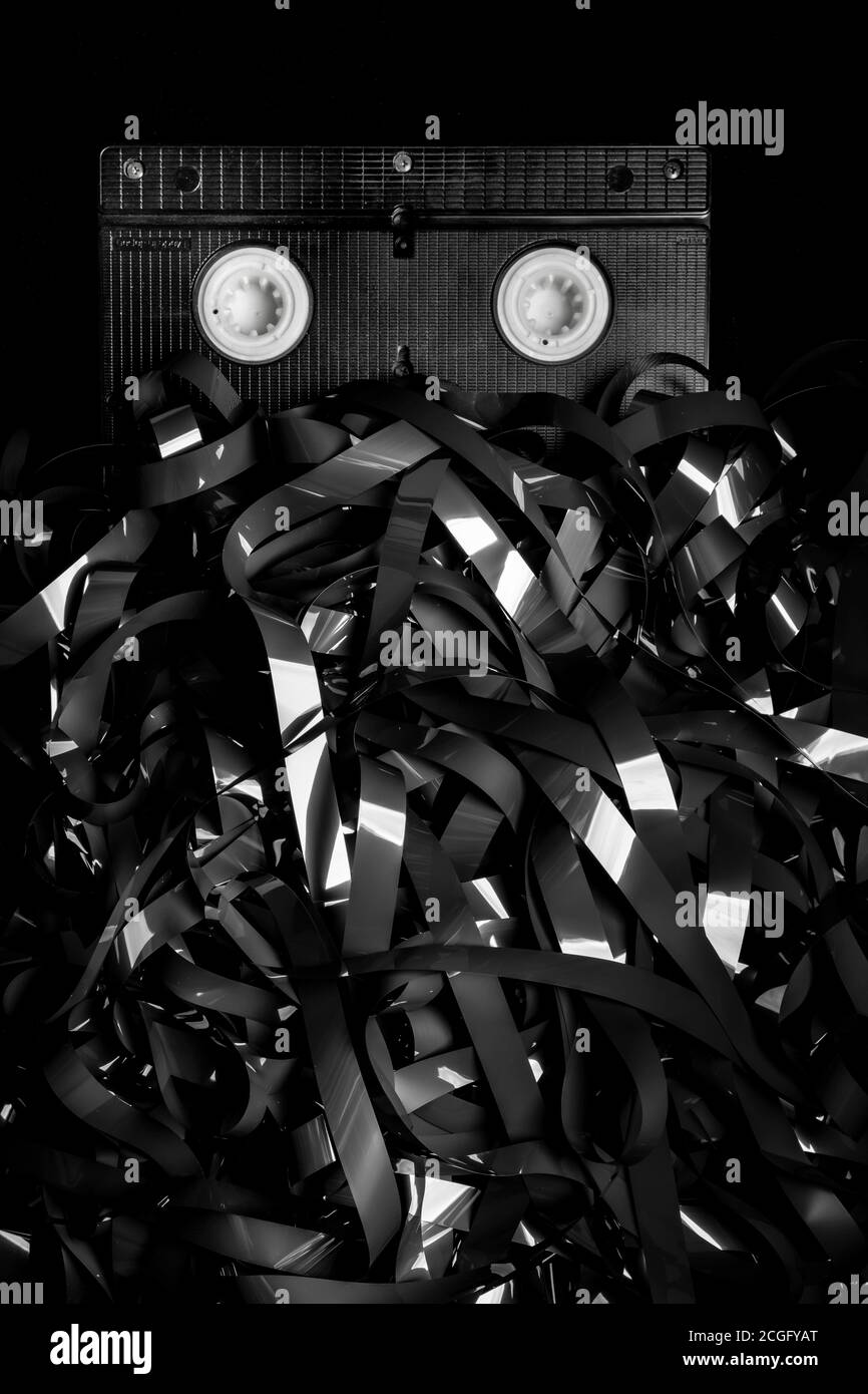 recording tape from an old VHS video recorder in a large