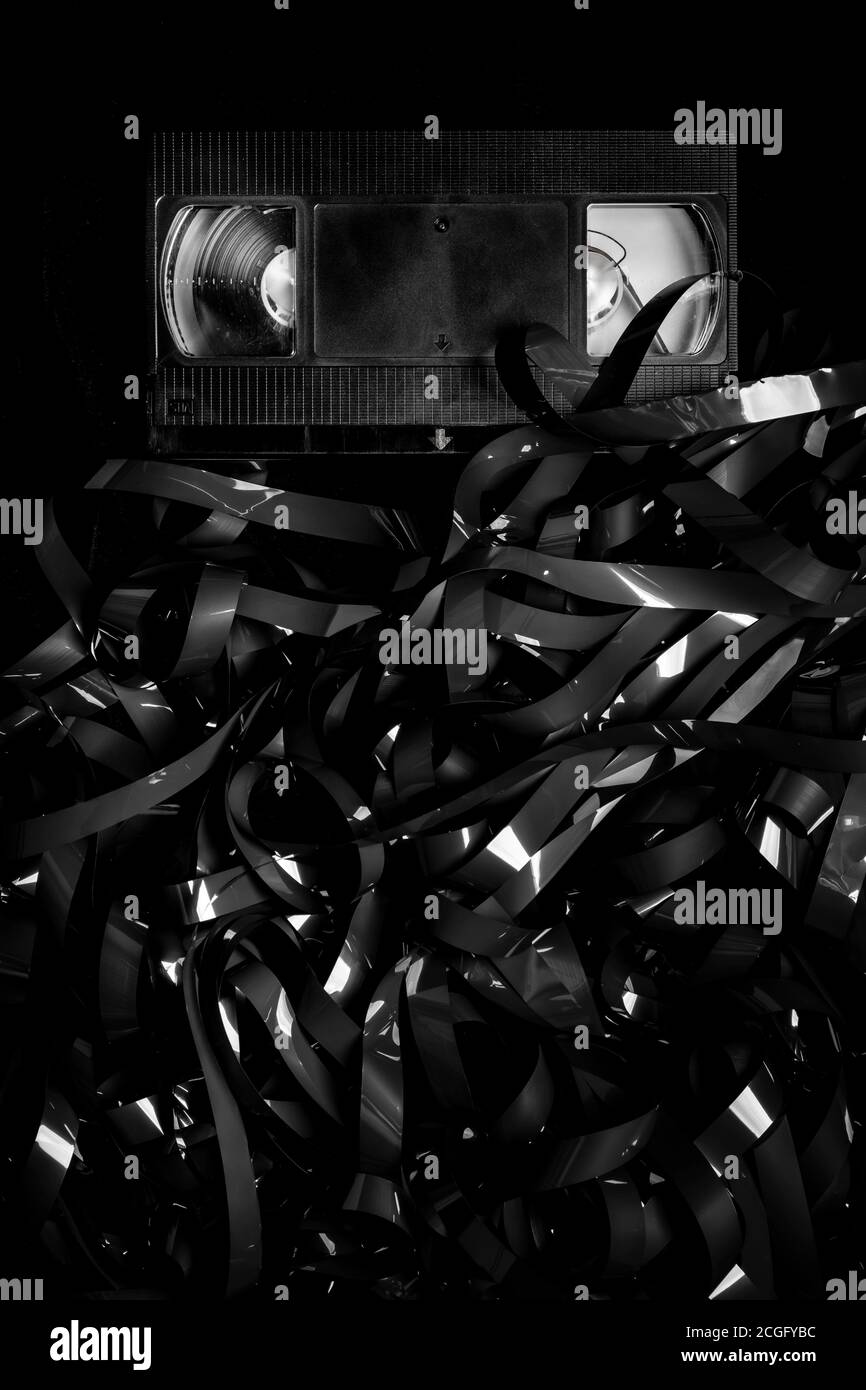 recording tape from an old VHS video recorder in a large