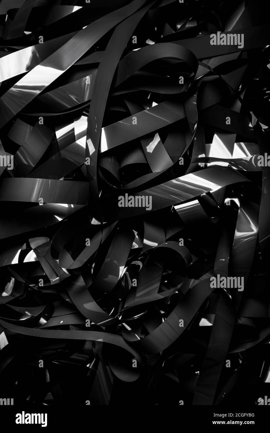 recording tape from an old VHS video recorder in a large