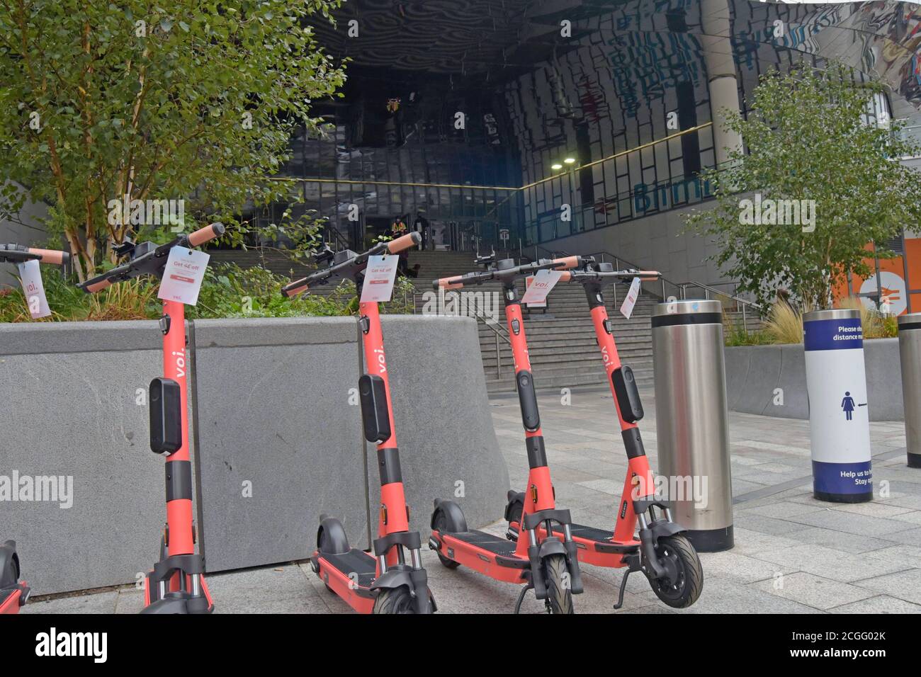 New Voi electric dockless scooters parked outside New Street Station, Birmingham. The rental system  began in Birmingham & Coverntry in September 2020 Stock Photo