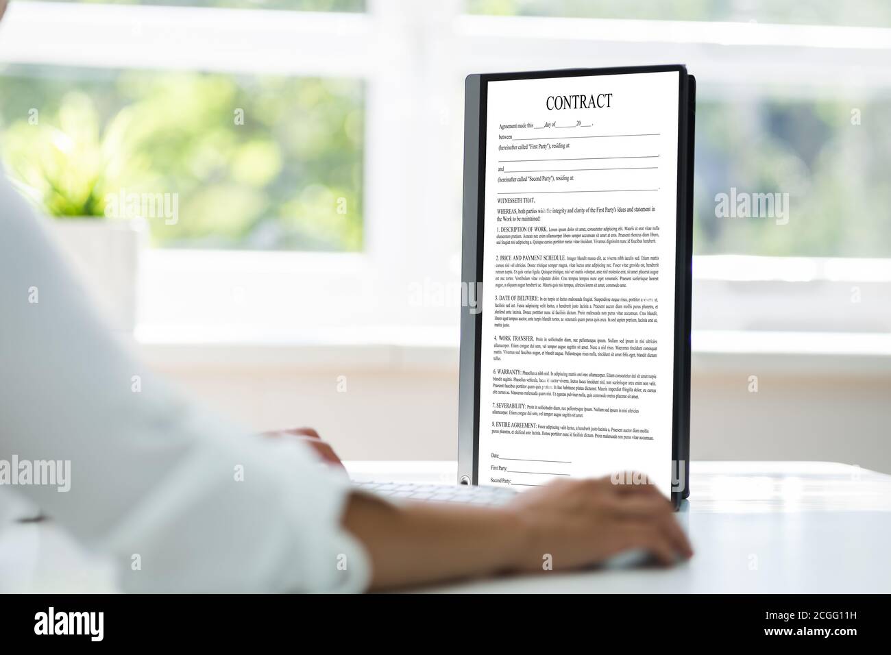 Employee Job Application Contract On Computer. Banking And Finance Stock Photo