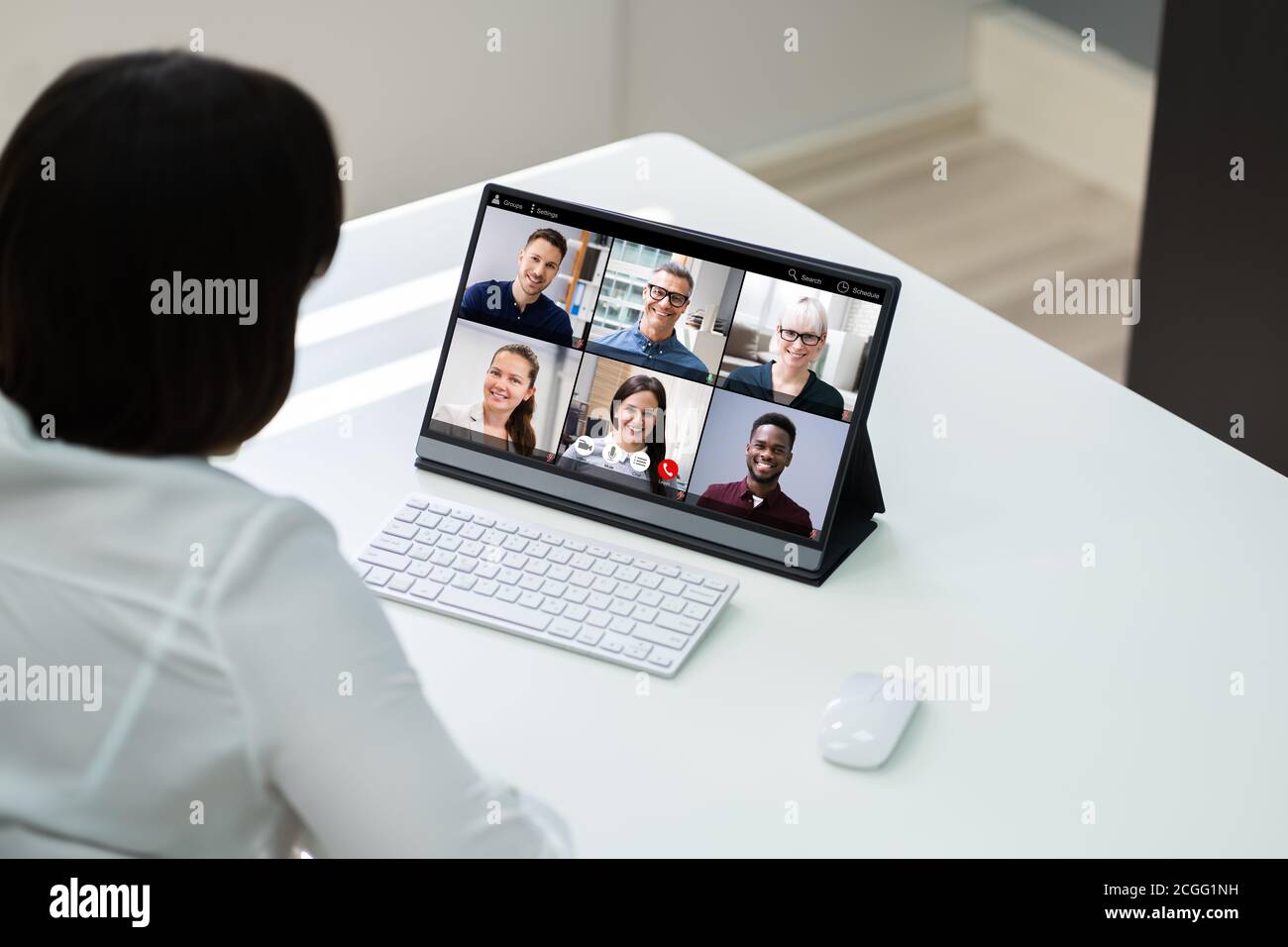 Online Video Conference Or Business Interview On Tablet Stock Photo